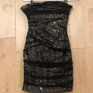 Bebe strapless mini dress.. perfect for New Years or any holiday party!